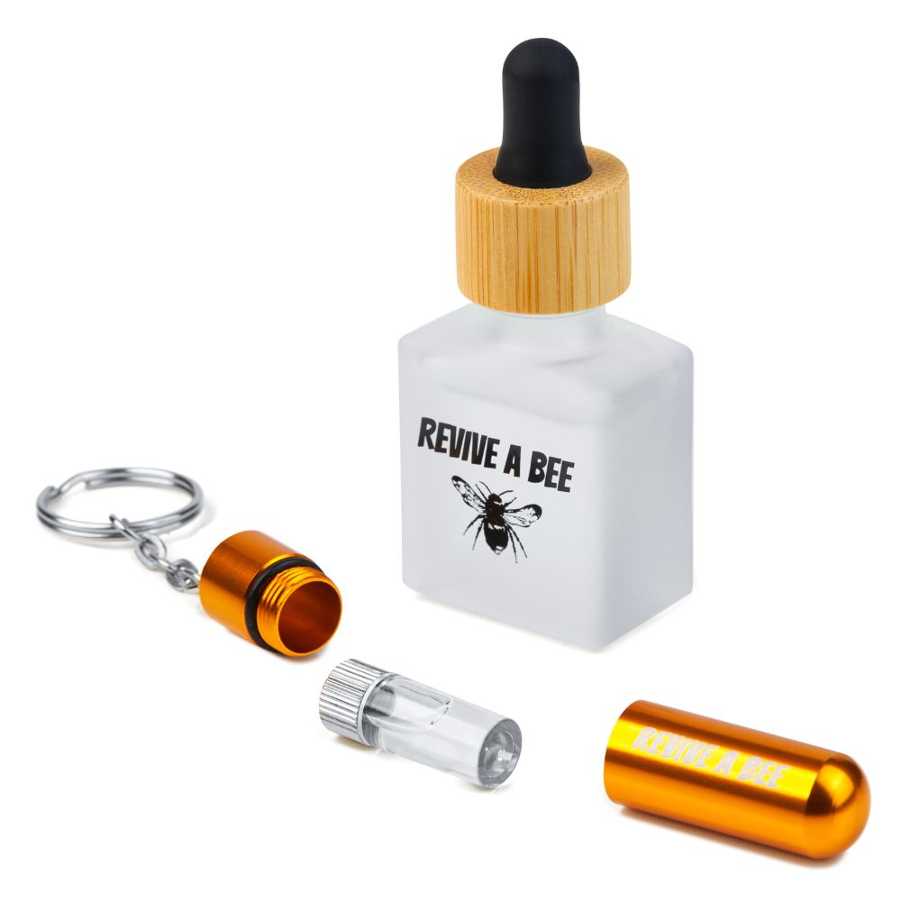 Gold Revive a Bee gift box with a bee revival kit and refill bottle